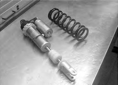 SHOCK ABSORBER INSPECTION Visually inspect the shock absorber and look for