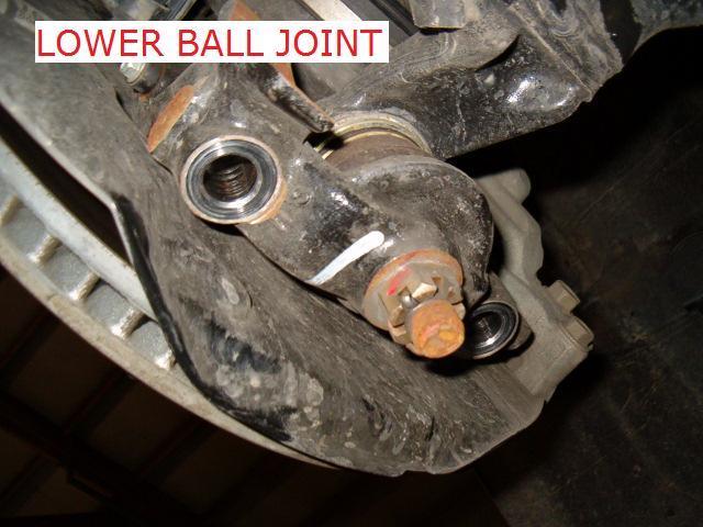 separate the ball joint from the spindle. 11.