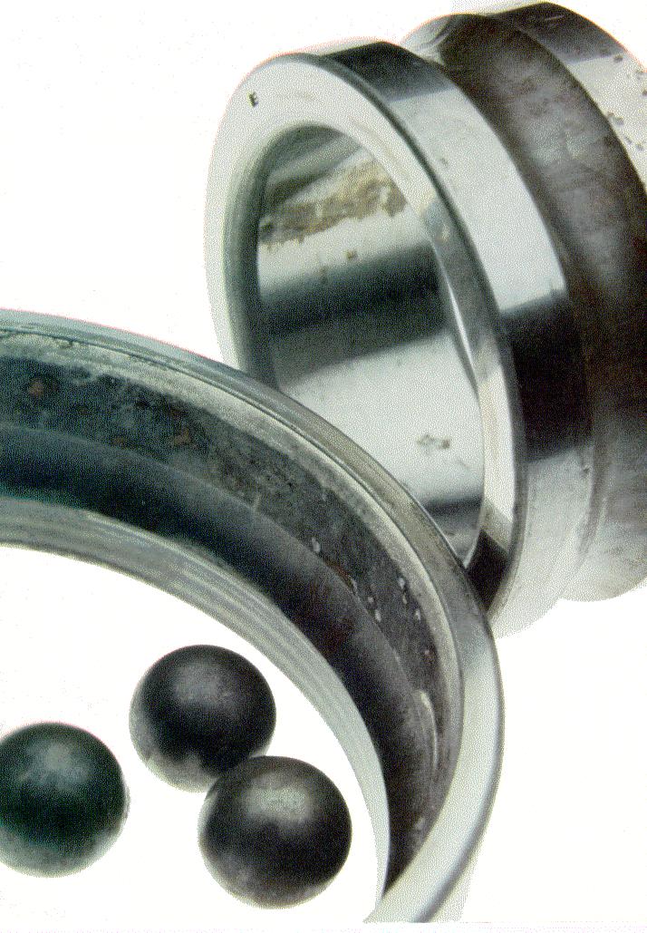 Corrosion Red/brown areas on balls, race-way, cages, or bands of ball bearings may be present Results from exposing bearings to corrosive fluids or a corrosive atmosphere