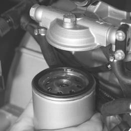 Do not smoke when working at or around the fuel system and avoid open fire. Fit the fuel filter Clean the surface to touch the engine before fitting the filter.