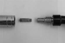 Remove the shroud (11) and then unscrew the torch tip (12) from the MIG torch (10) by turning the torch tip (12) anti-clockwise.