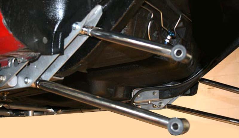 Mount the 4-link bars into the frame bracket using the button headed 5/8 x 18 x 2¾ bolts with the stainless adjustors forward in the frame bracket.