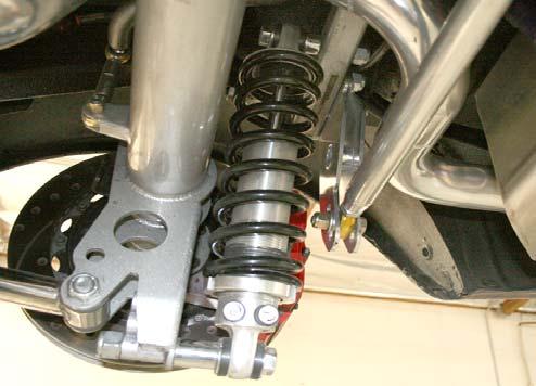 Center the loop in the driveshaft tunnel before tightening. The sway bar is connected to the axle housing brackets with a 3/8 x 1 ¼ inch button headed bolts.