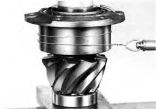 Use the pinion bearing spacer removed from the axle during disassembly. If the original spacer cannot be used, install the nominal spacer recommended in the adjacent chart.