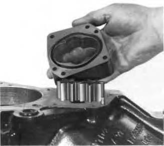 To remove the "smaller-diameter" sliding clutch, (used on earlier model axles), the