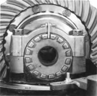 When forward axle pinion is equipped with slotted nut, remove roll pin with a pin punch then loosen nut. Rear Axle Forward Axle 2.