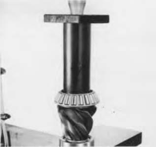 Press inner bearing cone on pinion.