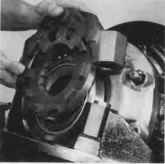 If the same gear set is used, install the assembled bearing cap, adjuster and lock on the backface side of the ring gear. Otherwise install adjuster and cap separately.