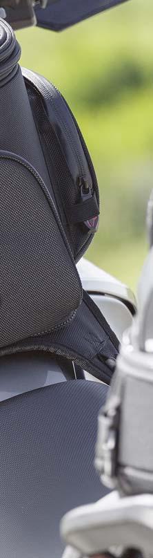 motorcycle tank. Two quickrelease buckles allow easy refueling.