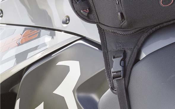 compartment > Attachment points for GPS mount > Cable port > Retroreflective details > Zip fastener > Snap