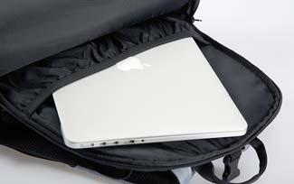 1  Management > 2 main compartments > Integrated laptop holder (15") (1) > Cable feed-through >