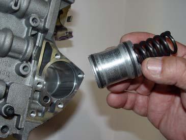 STEP 10. 4 Speeds ONLY: Install the piston as removed (See Figure 6) with the non-hollow end into the bore, replacing the original spring with the supplied B&M 3-4 accumulator spring.