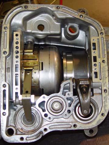 Install the supplied B&M rear servo blocker as indicated infigure 16. Reassemble the piston, the original piston spring, and the supplied external retaining ring (See Figure 16). STEP 21.