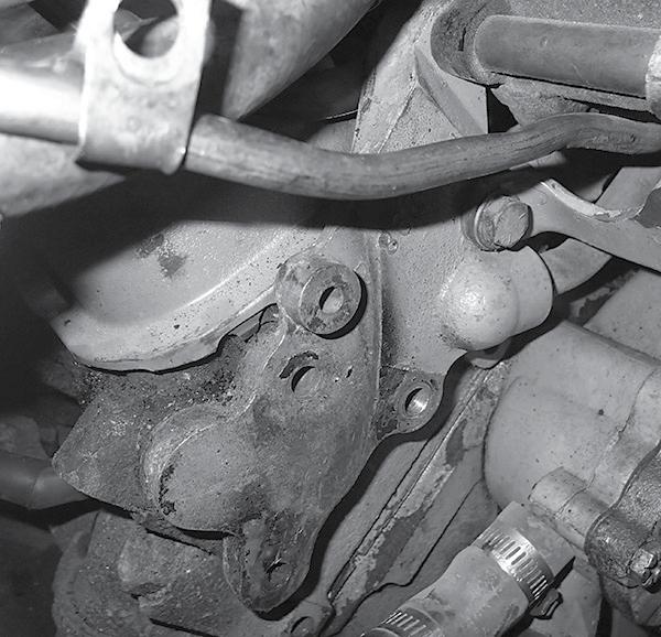 If your engine is equipped with a smog pump, but is not equipped with a smog pump bracket on the front surface of the passenger side cylinder head as shown in Photo 2, below, please contact Vintage
