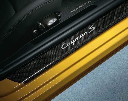 Door sill guards in carbon These carbon-fibre guards with model logo are a stylish reference to the racing origins of