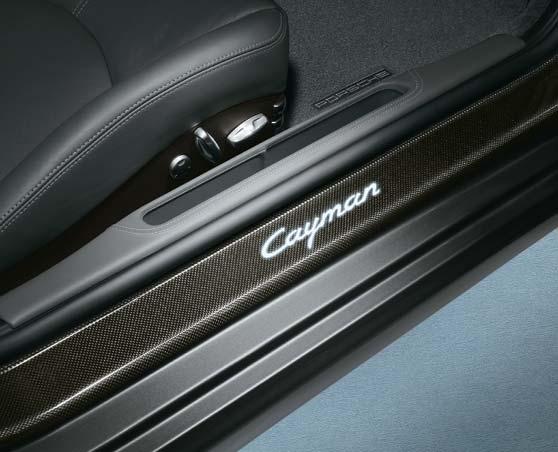 Door sill guards in carbon, illuminated A homage to Porsche motorsport.