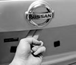 To lock the vehicle, push either door handle request switch, push the liftgate request switch or press the button 03 on the key fob.