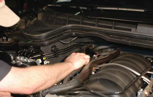 Facilitate the draining of coolant by removing the radiator cap.