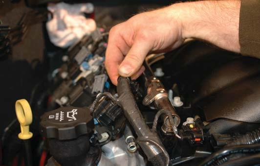 13. Pull the injector wire loom free from the stock intake manifold