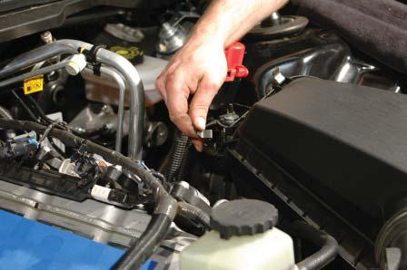 Remove the upper Radiator hose clamps from both