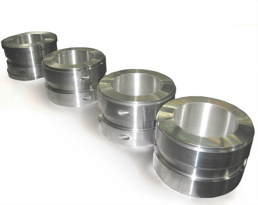 This bearing replaces a cylindrical bore bearing with oiling ring lubrication as well as pressure fed lubrication.