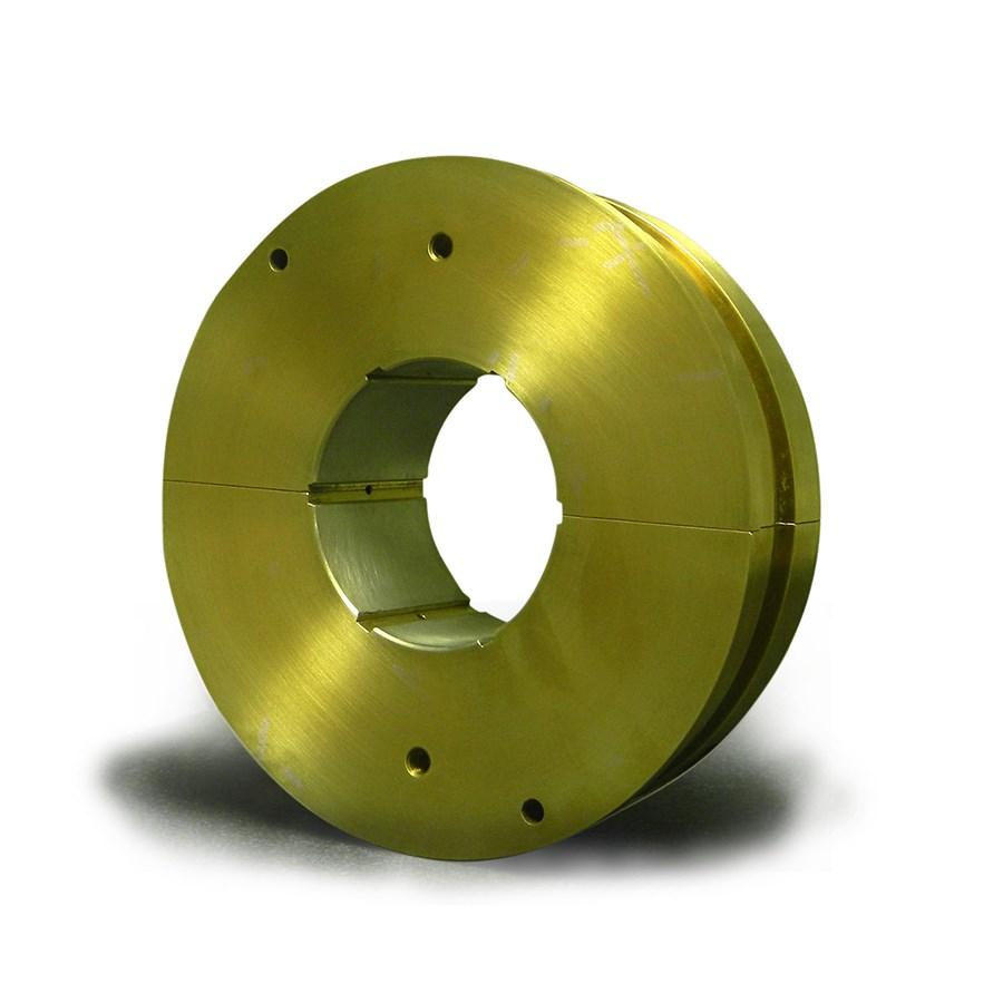 The top arcs have machining shims that are uniform in thickness to provide the desired machined curvature. Running shims are inserted behind the arcs to provide the desired converging oil film wedges.