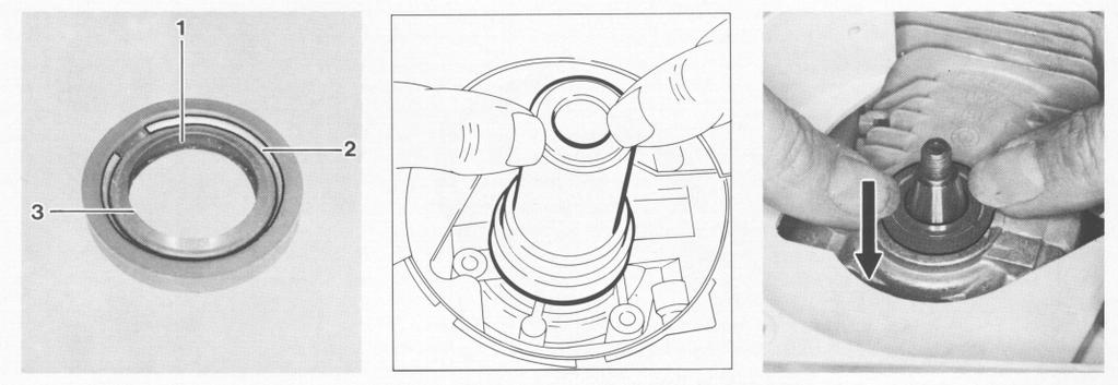 1 jaws to pull out the clamping ring. Pry the remaining part of the oil seal out of the housing. - Clean the sealing surface with a solvent-based degreasant containing no CFCs.