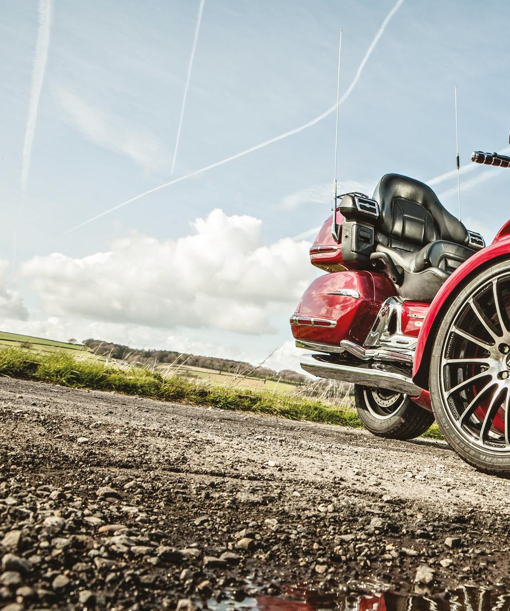 TRIKE MAIN FEATURE WORDS: CHRIS REES IMAGES: VAIDAS GERIKAS GOLD SPICE WE GET BEHIND THE TWIN FRONT WHEELS OF THE ALL-NEW STURGIS R18 REVERSE TRIKE BASED ON THE HONDA GOLD WING GL1800 AND TO SAY WE