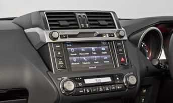 complemented by a dark instrument panel highlighted with silver accents.