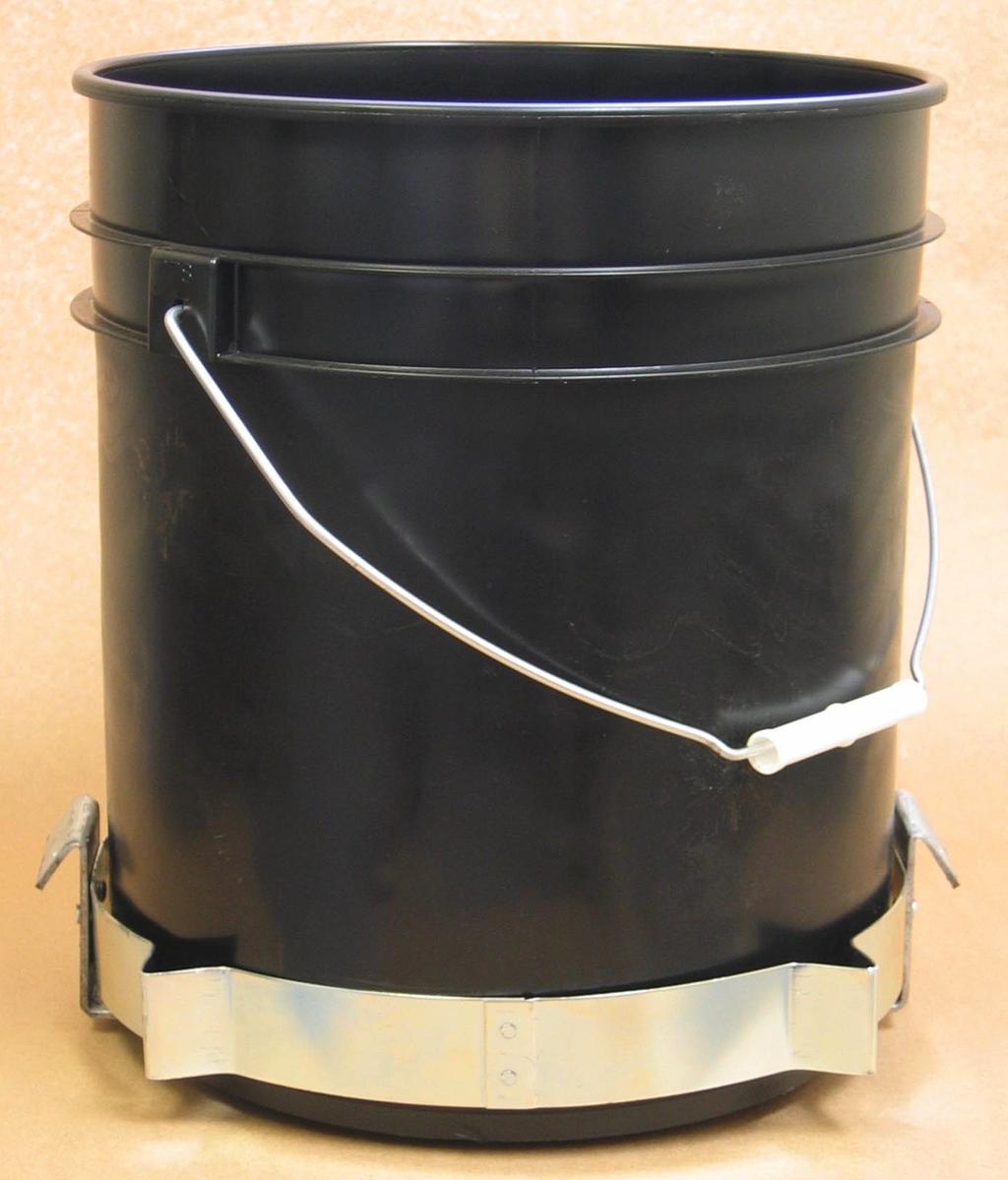 When the pail is about half empty it should be removed from the canister and the centering ring turned over so that the pail is sitting elevated 3
