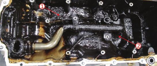 Some light debris in the oil pump pick-up tube screen should be considered normal. Use your judgement to determine what is or what is not considered normal wear 1. Sludge in the pan 2.