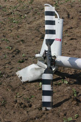Figure 2 Tail section showing crushed vertical upper fin from inverted impact and no evidence of tail rotor rotation. 1.12.4 The tail boom was not struck by the main rotor blades.