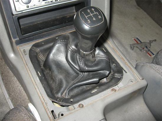 15. Replace leather shifter boot over new shifter and reinstall the shift knob. 16.