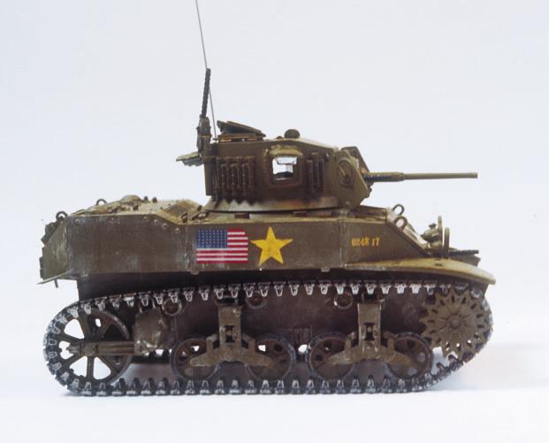 Armor How-To Special Stuart Ron converted Tamiya s 1/35 scale M5A1 Stuart to the earlier M5 configuration by modifying kit parts and adding a simple scratchbuilt interior.