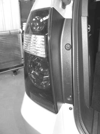 Using a plastic trim removal tool or similar, carefully leaver the tail light