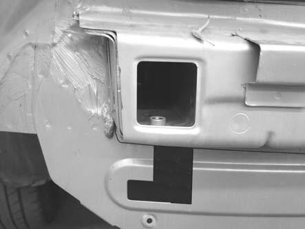 On the RHS of vehicle back panel locate the existing rectangular hole shown. 22. From this hole mark out the back panel as shown. 30mm LHS RHS 23.