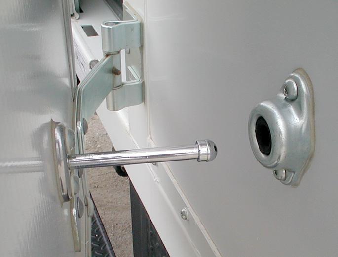 Rotate the handle s upper latch up with one hand. 3. With the other hand, pull the handle up and away from the door. 4.