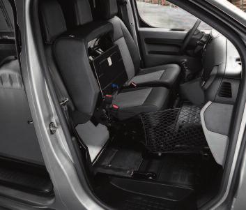The outer passenger seat folds upwards to reveal unobstructed space on the flat floor, while the large panel in the steel
