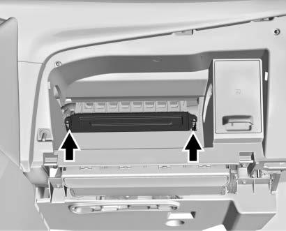 Squeeze both sides of the glove box bin inward to lower beyond the stops. 5. Release the latches on either side of the service door. Open the service door and remove the old filter. 6.