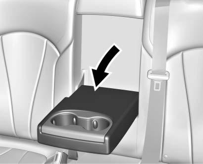 64 Seats and Restraints Rear Seat Armrest Heated Rear Seats { WARNING If you cannot feel temperature change or pain to the skin, the seat heater may cause burns.