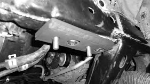 Install 3/8 bolts into the sway bar relocation brackets, without washers on the head of the bolt.