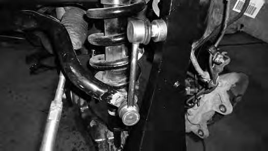 Tighten upper ball joint nut to 81 ft-lbs. Reinstall the factory cotter pin. Do not loosen the nut to get the factory cotter pin to reinstall. 55.