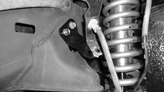 60. Clearance the original brake line bracket locating hole to ¼ ~9/32.