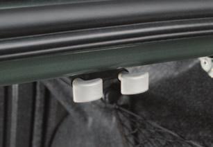 The left handle opens the larger seatback; the right handle opens the smaller side. 3. Push the seatback open through the trunk or pull it open from inside the vehicle.