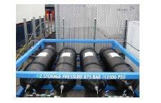 71 m3/min (25 scfm) and capable of pressurizing the storage banks to 875 bar was purchased from Pressure Products Industries.