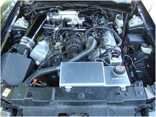 11. Using the factory recommended antifreeze to water ratio, refill the coolant expansion tank and replace the factory radiator cap.