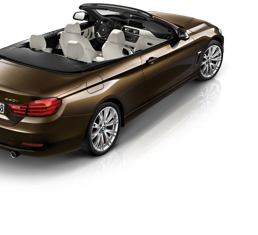 Just a whisper above the ground, the smooth dark lustre of the BMW Individual Pyrite Brown metallic paint flows across the car s powerful contours.