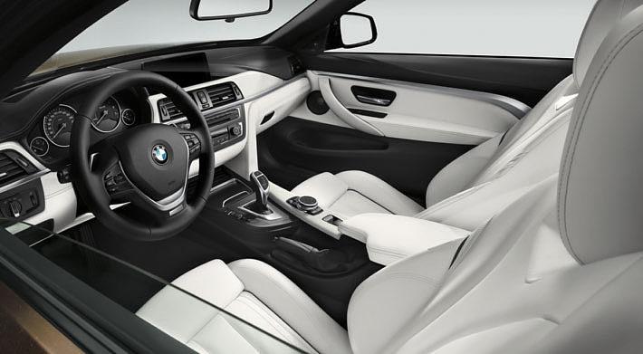 Facing the sky: with the top down, the enticingly bright interior develops its unique charisma. The velvety surface of the BMW Individual Extended Merino leather in Opal White speaks of sheer luxury.