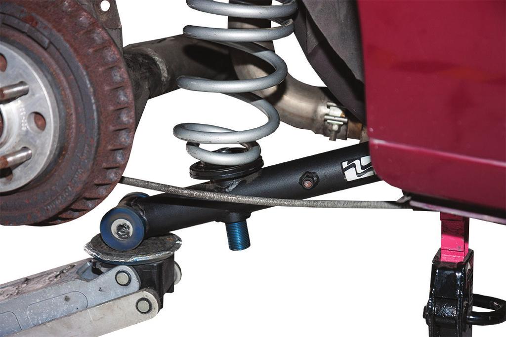 Stock Location Spring Removal 36. If the vehicle is equipped with quad shocks, verify that there is sufficient clearance between the outside of the coil-over spring and the quad shock piston rod.