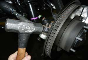 Remove the axle nut safety keeper and then remove the axle nut. (Fig 7) If 2WD, ignore this step.